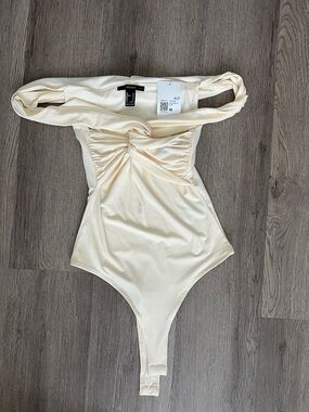 Cream Off the shoulder bodysuit with Twist Front